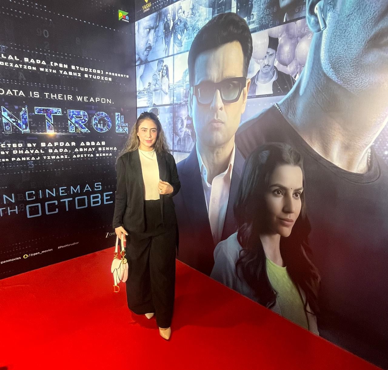 Portrait of an elegant event director in a black blazer